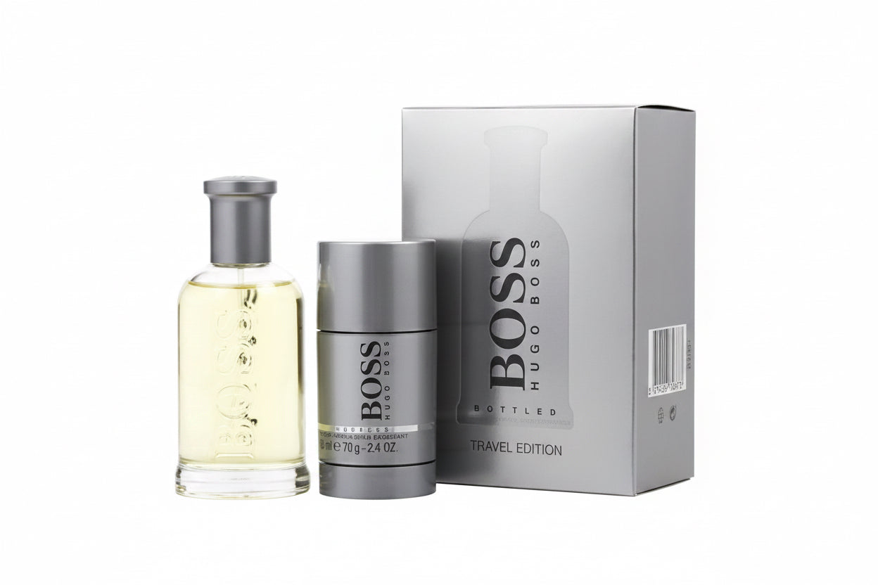 Hugo Boss perfume bottle and travel edition packaging on a white background