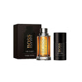 Hugo Boss The Scent perfume set with bottle and packaging on a white background