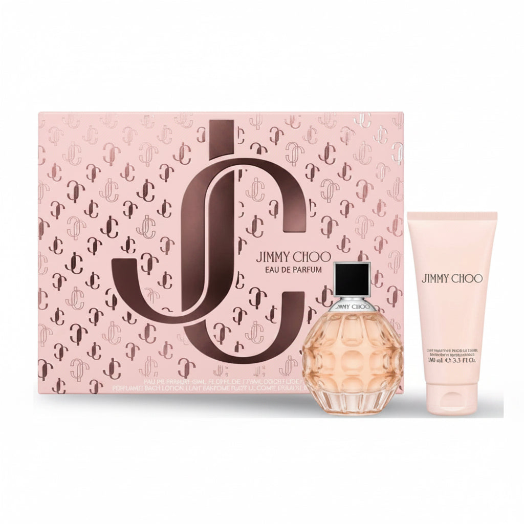 Jimmy Choo Eau de Parfum gift set featuring a pink patterned box with a large metallic logo, a faceted clear bottle filled with pale amber liquid, and a matching pink body care tube on a white background. 